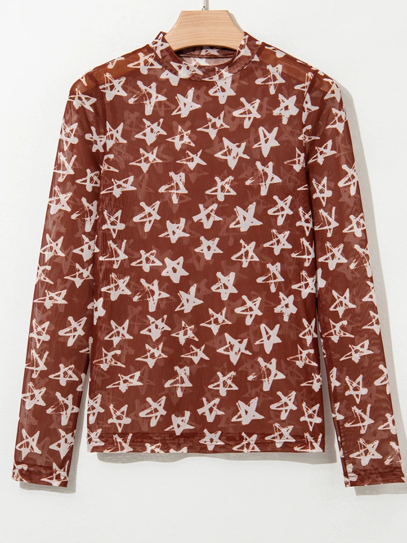 Celestia Star Print Long Sleeve Sheer Mock Neck Top