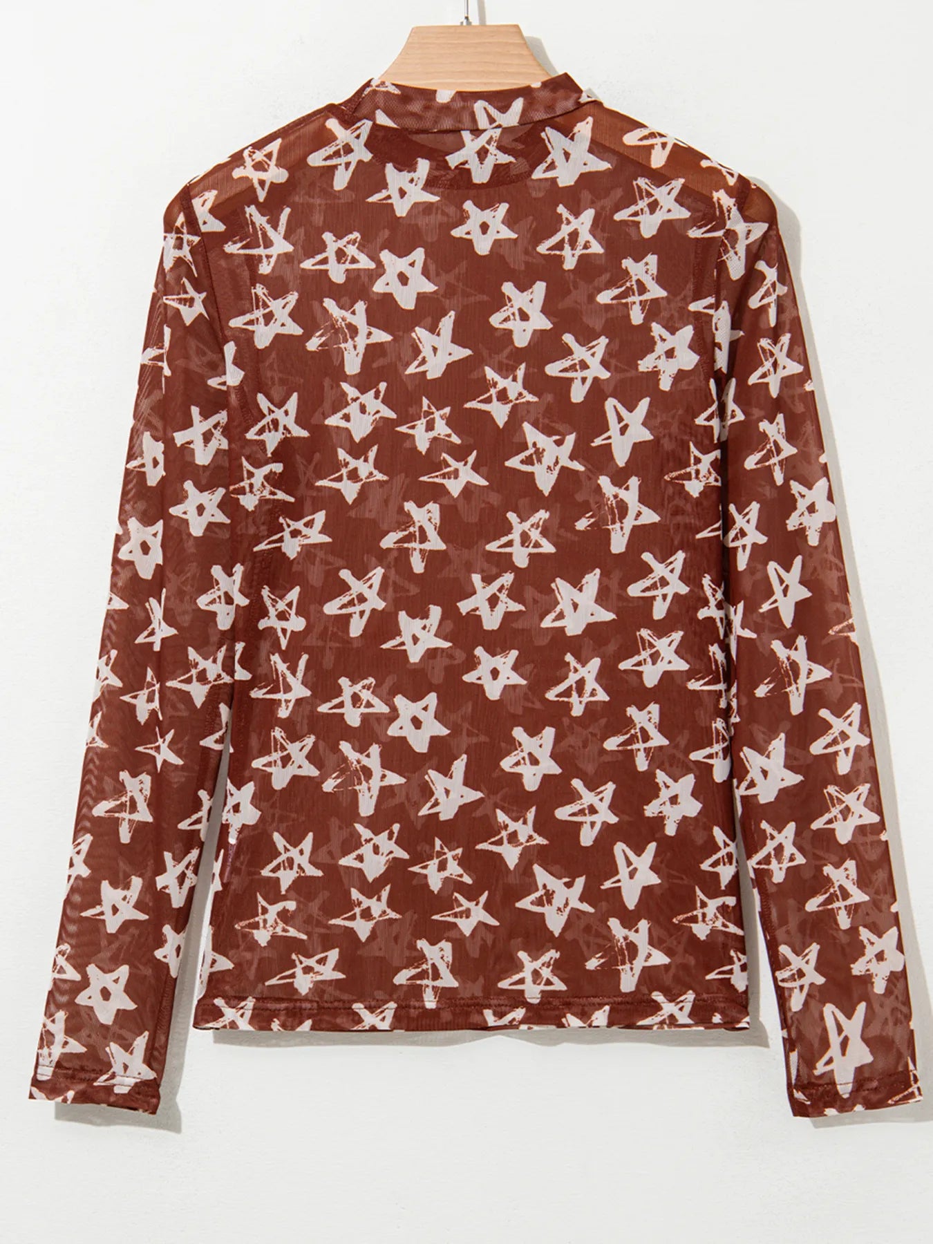 Celestia Star Print Long Sleeve Sheer Mock Neck Top