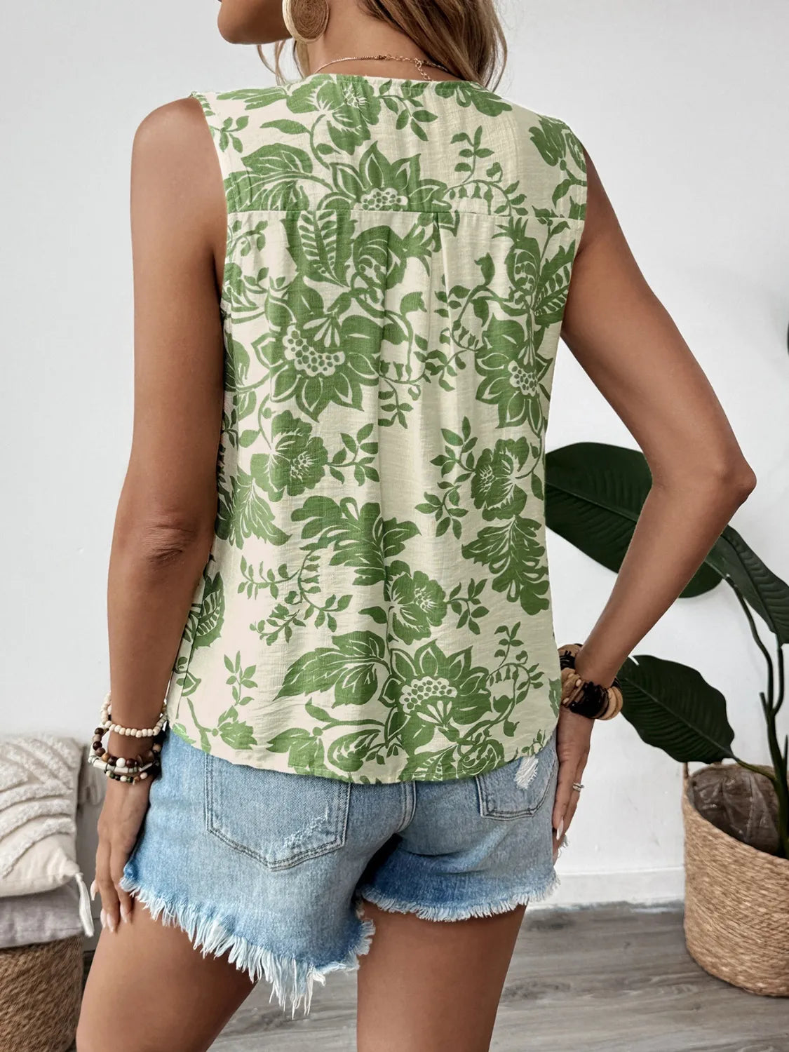 Bloom Flare Sleeveless Peplum Blouse