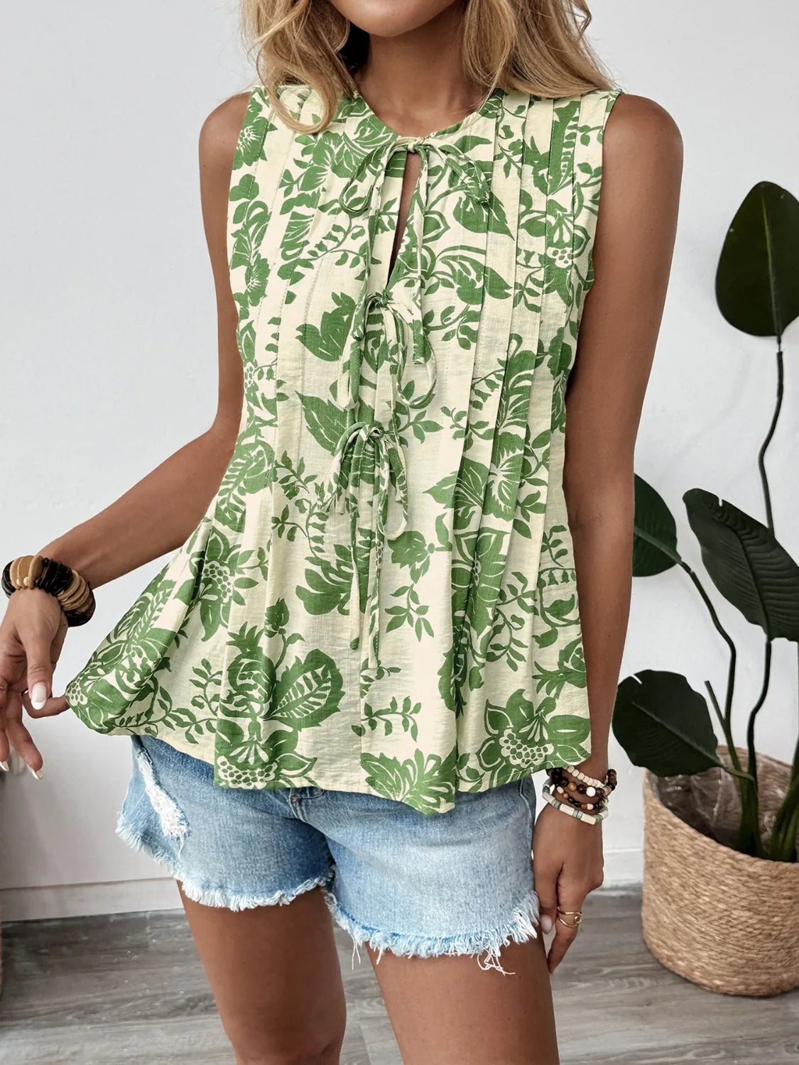 Bloom Flare Sleeveless Peplum Blouse