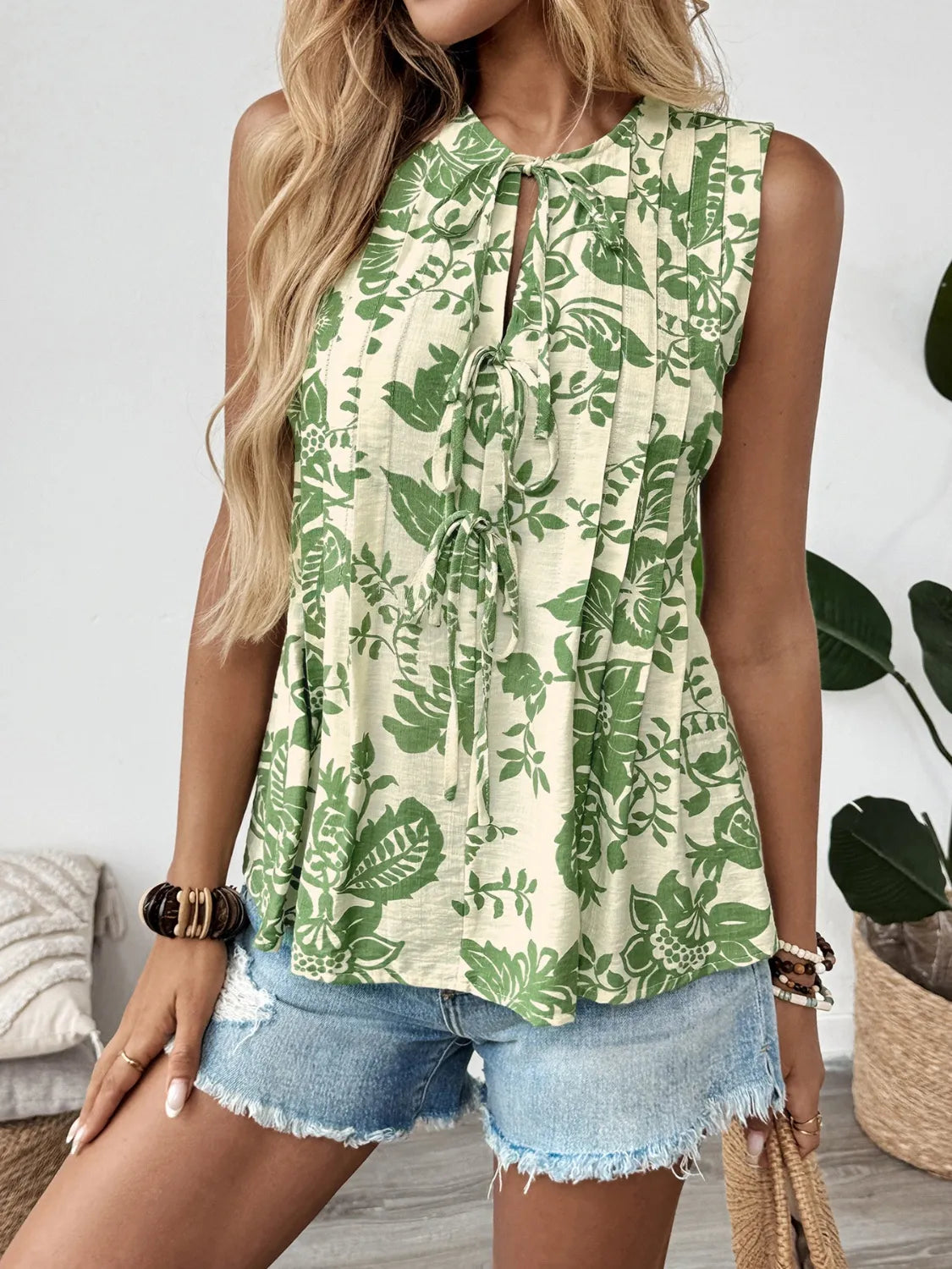 Bloom Flare Sleeveless Peplum Blouse