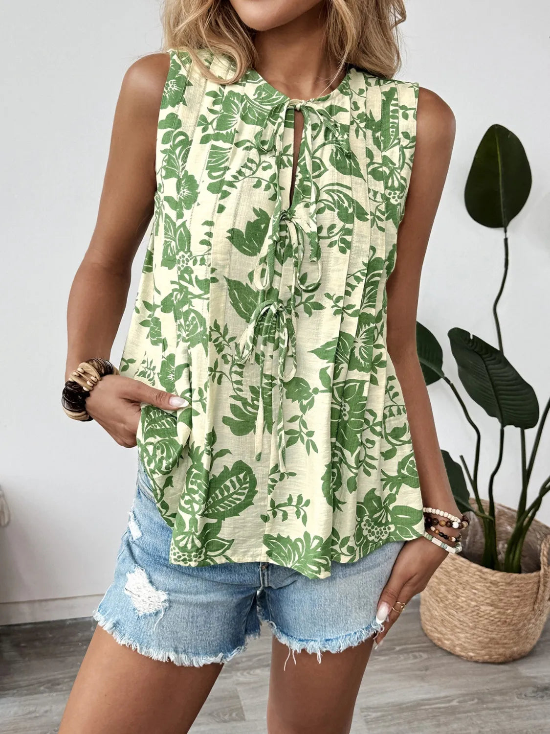 Bloom Flare Sleeveless Peplum Blouse