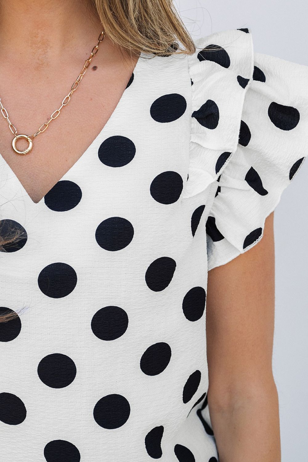 Polka Dot Ruffled Cap Sleeve V-Neck Blouse - Chic & Playful