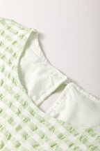 Textured Short Sleeve Tiered Mini Dress - Chic & Flowy